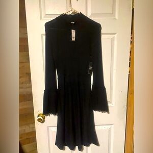 Black long sleeved
Size XS